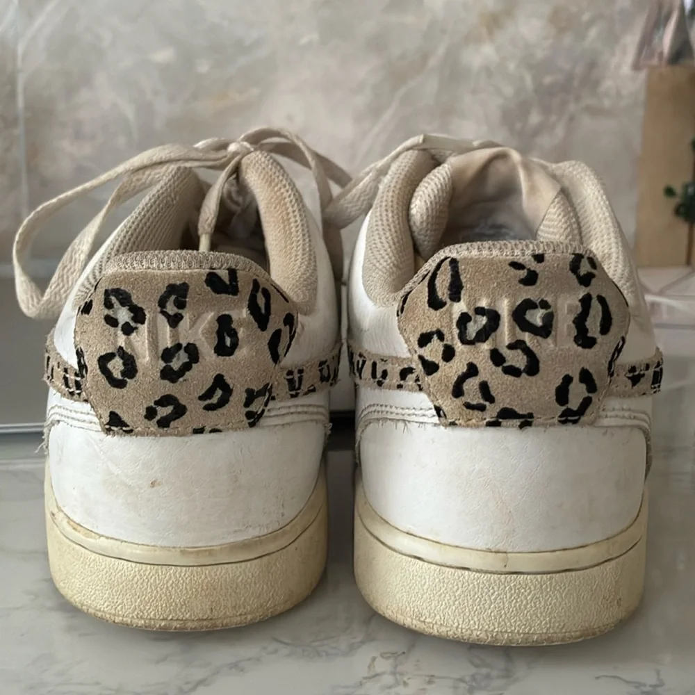 Nike Court Vision Low Leopard Swoosh Shoes